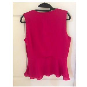 Dark pink sleeveless blouse